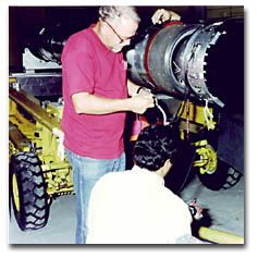 people building a telescope