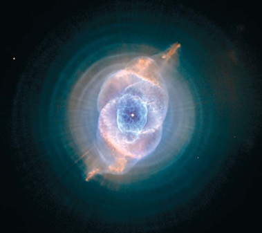 a nebula with a bright white center with concentric rings of blue and orange that resembles a cat's eye