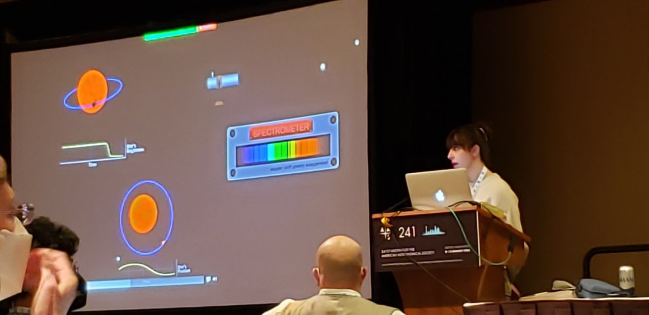 Presenting my new method for detecting exoplanets via their radio emissions during microlensing events at AAS 2023.