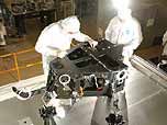 photo of engineers working on WFC3 in the clean room